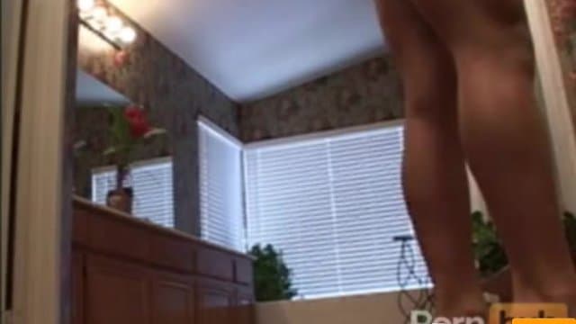 Athletic woman taking her clothes off thumbnail